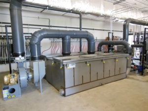 An air stripper system removed BTEX from a heavy solids loading environment