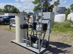 This rental blower system includes a rotary claw DPE and Rotary vane air sparge on a common skid