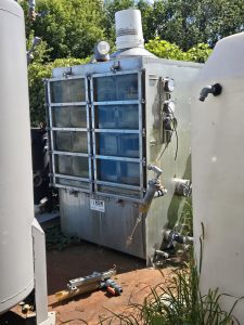 A rental tray air stripper designed for water treatment of VOCs like benzene, toluene, PCE, TCE, and more